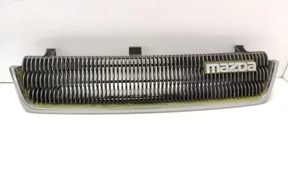 Mazda 929 Front bumper upper radiator grill HF7550710 886041