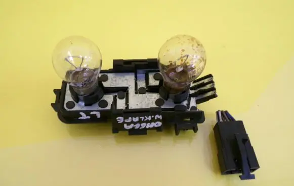 Opel Vectra B Tail light bulb cover holder 5034GM