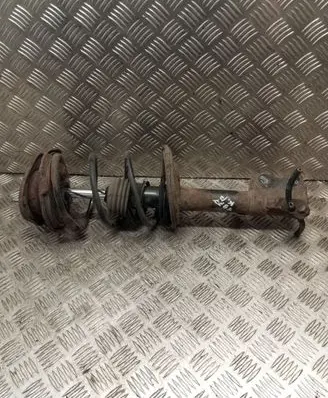 Toyota Corolla E110 Front shock absorber with coil spring