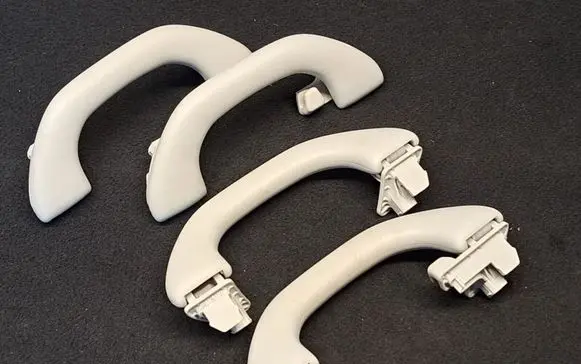 Volkswagen Touran II A set of handles for the ceiling 1K0857607M 1K0857607N