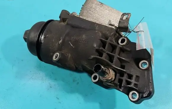 KIA Ceed Oil filter mounting bracket 264002A325 IMPRK1584666