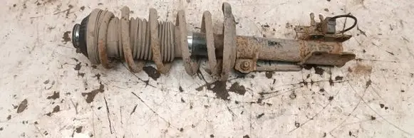 Opel Zafira B Front shock absorber with coil spring 01HL2