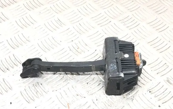 Front door check strap stopper
