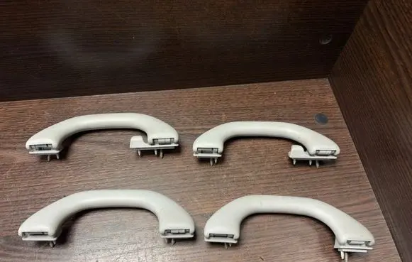 Front interior roof grab handle