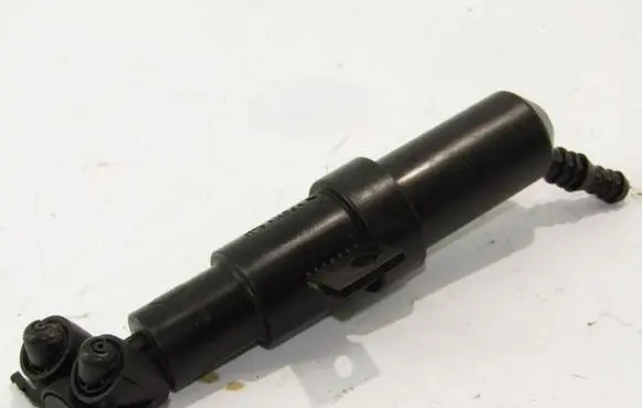 Headlight washer spray nozzle