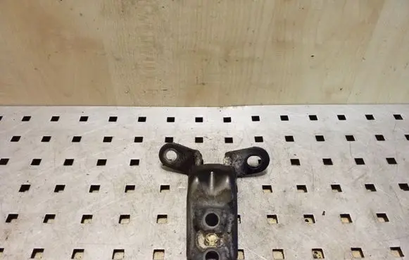 Front door lower hinge