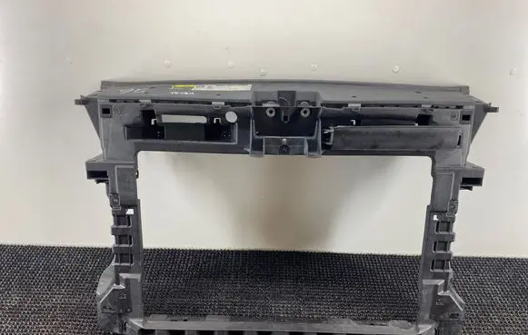 Radiator support slam panel