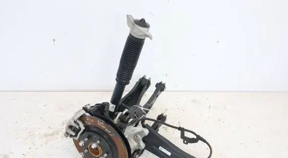 Rear wheel hub spindle/knuckle