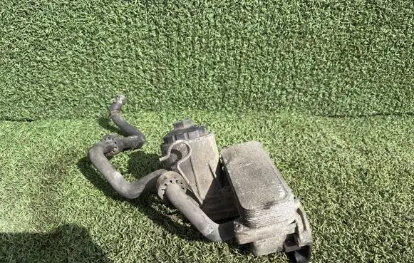 Volkswagen Transporter - Caravelle T5 Oil filter mounting bracket 070115389 070115389E
