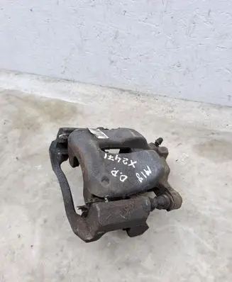 Opel Corsa F Front brake caliper 9824176680