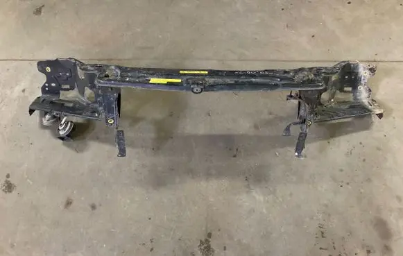 Top upper radiator support slam panel