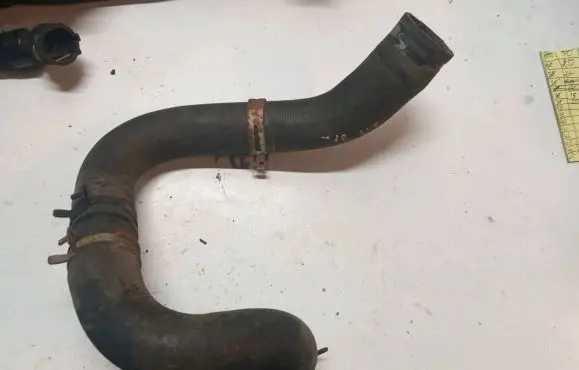 Chrysler Voyager Engine coolant pipe/hose 05005315AD