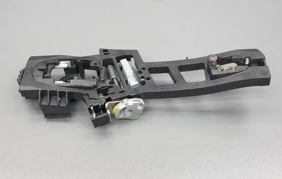 Ford Fiesta Front door exterior handle/bracket 8A61A224A37AN ET76A224A37SA