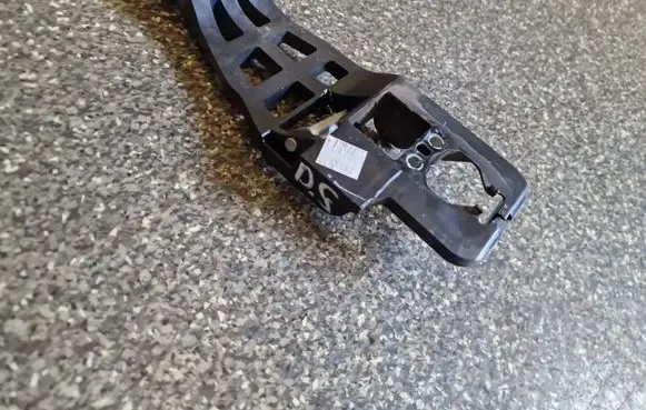 Rear door exterior handle/bracket