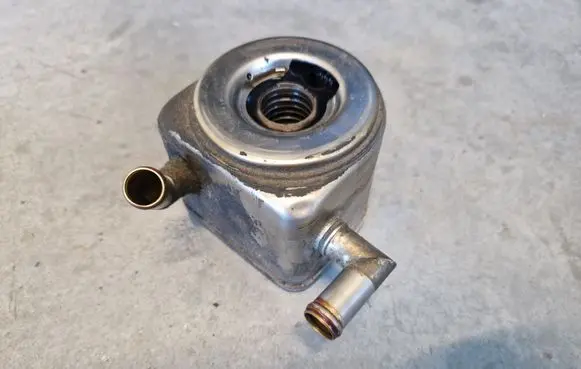 Nissan Patrol Y61 Oil filter mounting bracket 