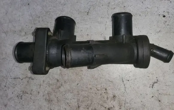 Thermostat/thermostat housing