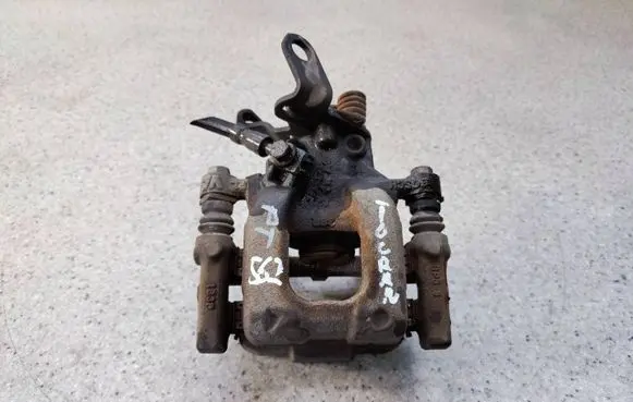 Volkswagen Touran II Rear brake caliper 