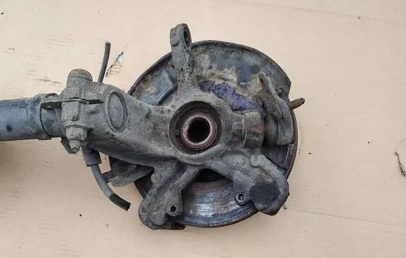 Front wheel hub spindle knuckle