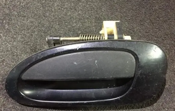 Mazda 323 Front door exterior handle