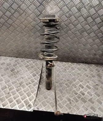 Volkswagen Caddy Front shock absorber with coil spring