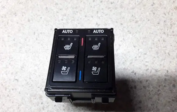 Seat heating switch