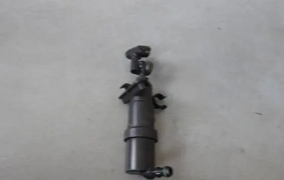 Volkswagen Golf IV Headlight washer spray nozzle 1J0955978A