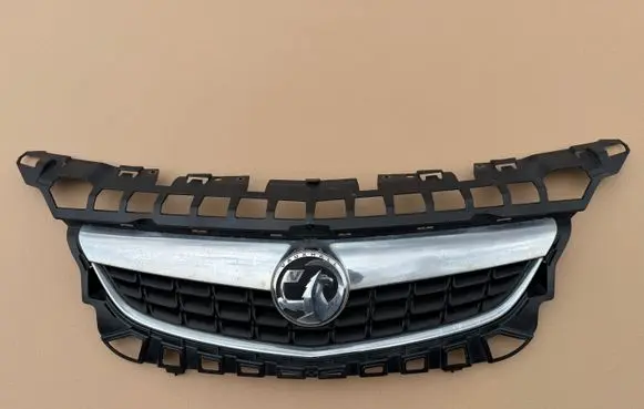Opel Astra J Front bumper upper radiator grill 13266577