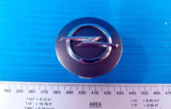 Opel Corsa E Original wheel cap 13276164 46759750