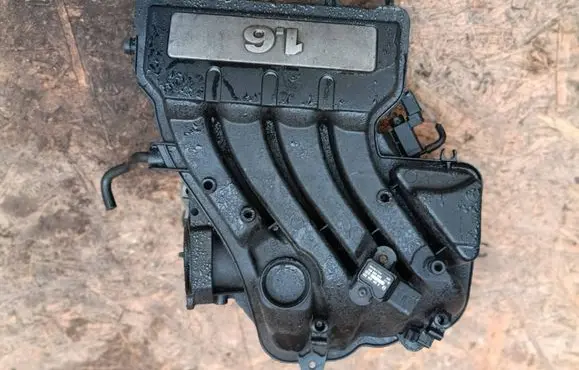 Volkswagen Golf Plus Engine mounting bracket 06A129723Q 0261230061