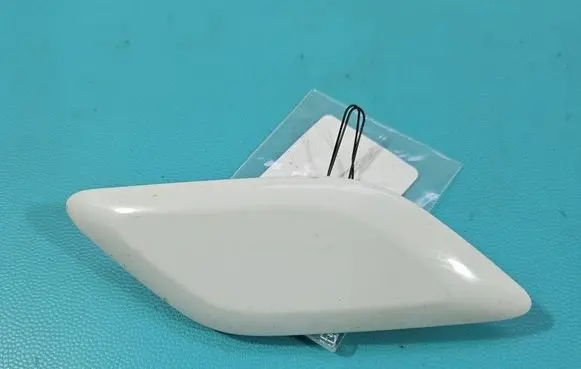 Headlight washer spray nozzle cap/cover