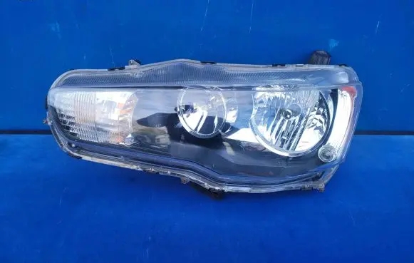 Mitsubishi Lancer VIII Headlight/headlamp P8597