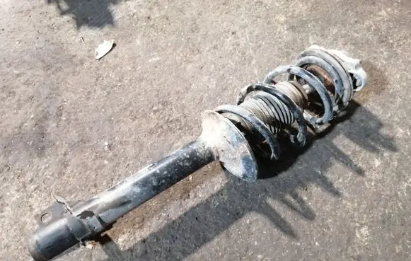 Front shock absorber with coil spring