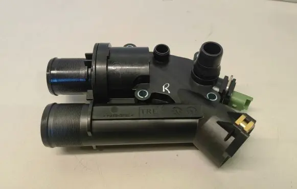 Thermostat/thermostat housing