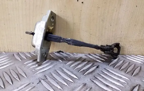 Toyota Yaris Verso Front door check strap stopper