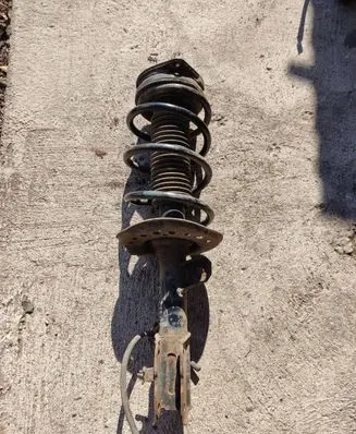 Front shock absorber with coil spring