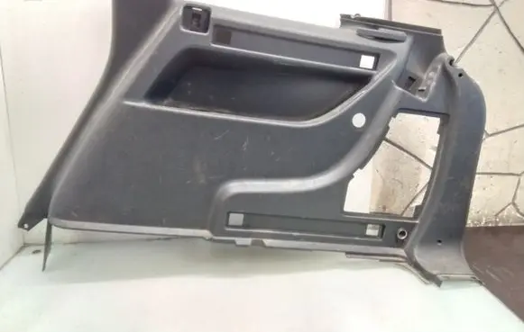 Trunk/boot lower side trim panel