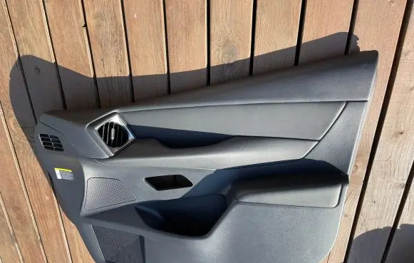 Front door card panel trim