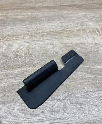 Front passenger seat rail trim