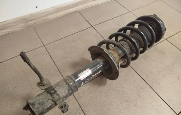 Mazda CX-7 Front shock absorber with coil spring 2A22868A