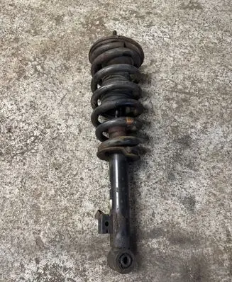 Mitsubishi L200 Front shock absorber with coil spring MR992321