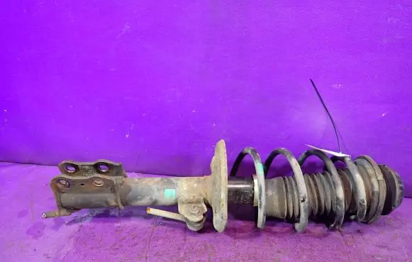 Toyota Yaris Front shock absorber with coil spring