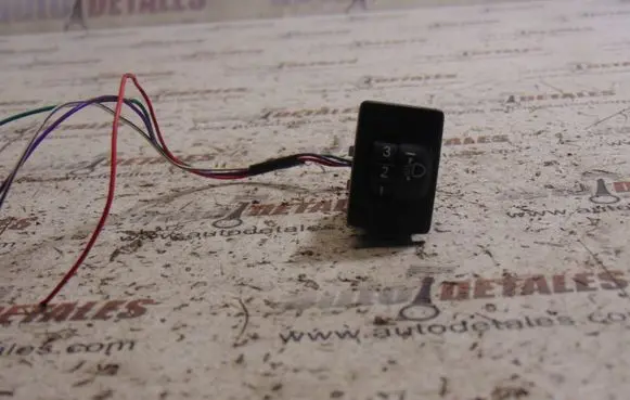 Headlight level height control switch