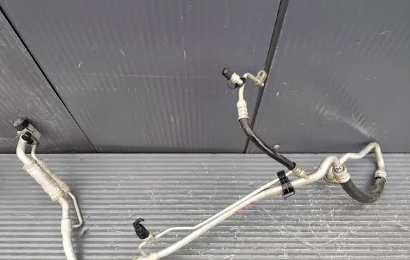 KIA Sportage Air conditioning (A/C) pipe/hose 97775CZ001