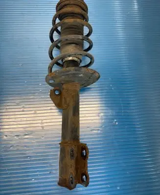 Toyota Yaris Front shock absorber with coil spring