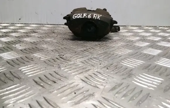 Volkswagen Golf VI Front brake caliper