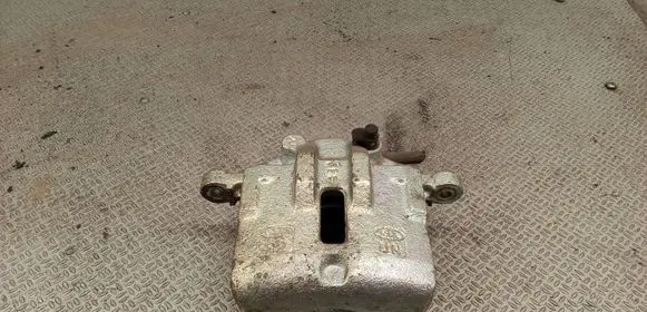 KIA Carens II Front brake caliper 
