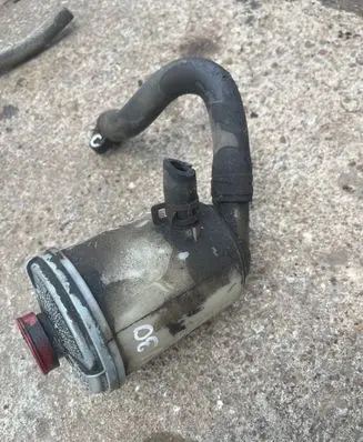 Power steering fluid tank/reservoir