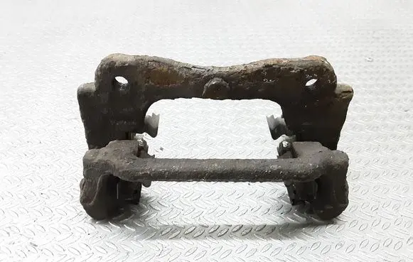 Toyota Avensis T250 Brake caliper pad carrier rear 