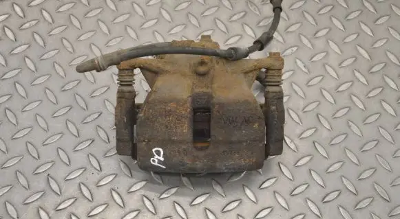 Volkswagen Golf VII Front brake caliper