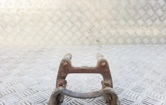 Volkswagen PASSAT B6 Brake caliper pad carrier rear 